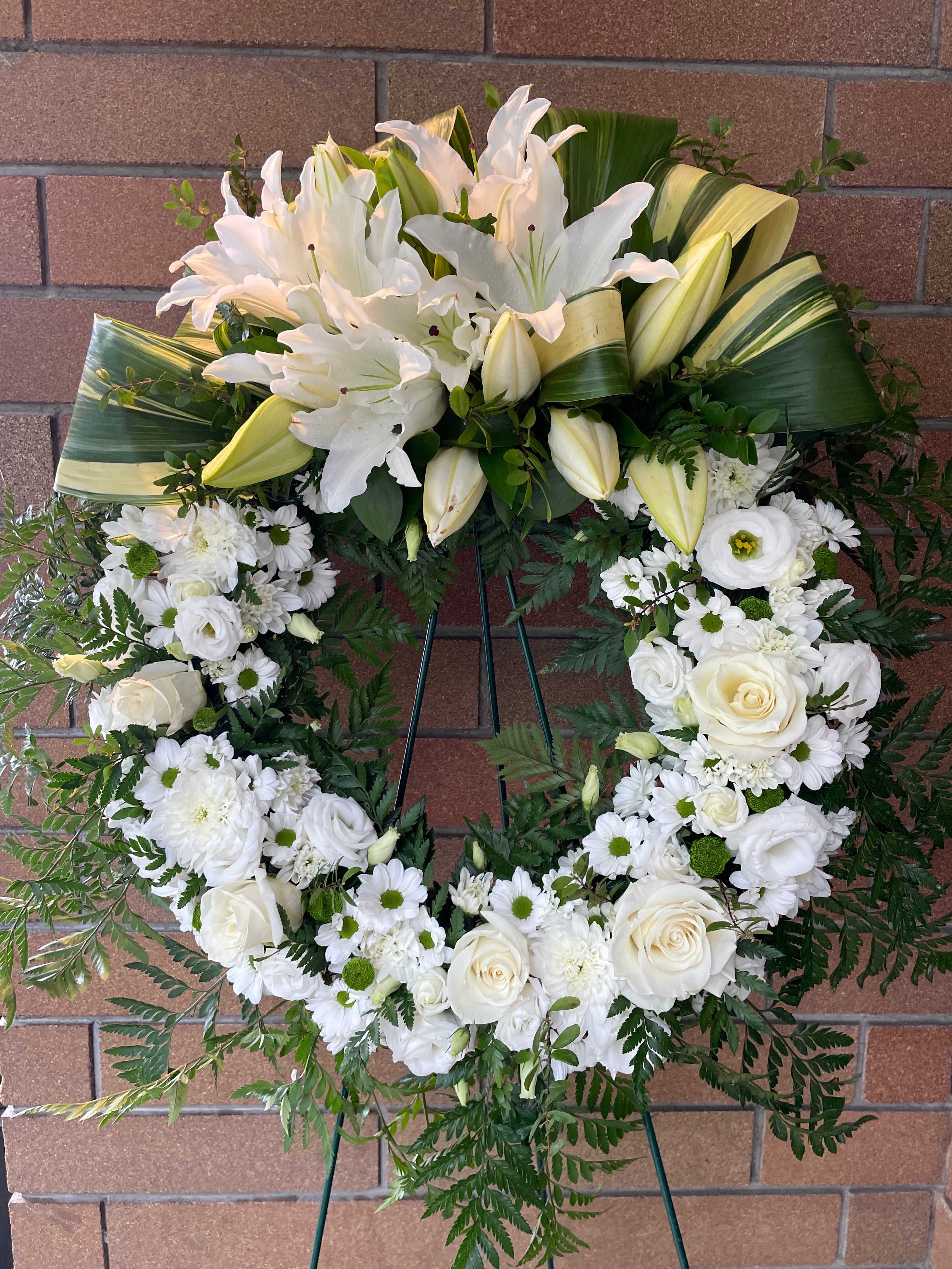Elegant Embrace wreath - Tooka Florist