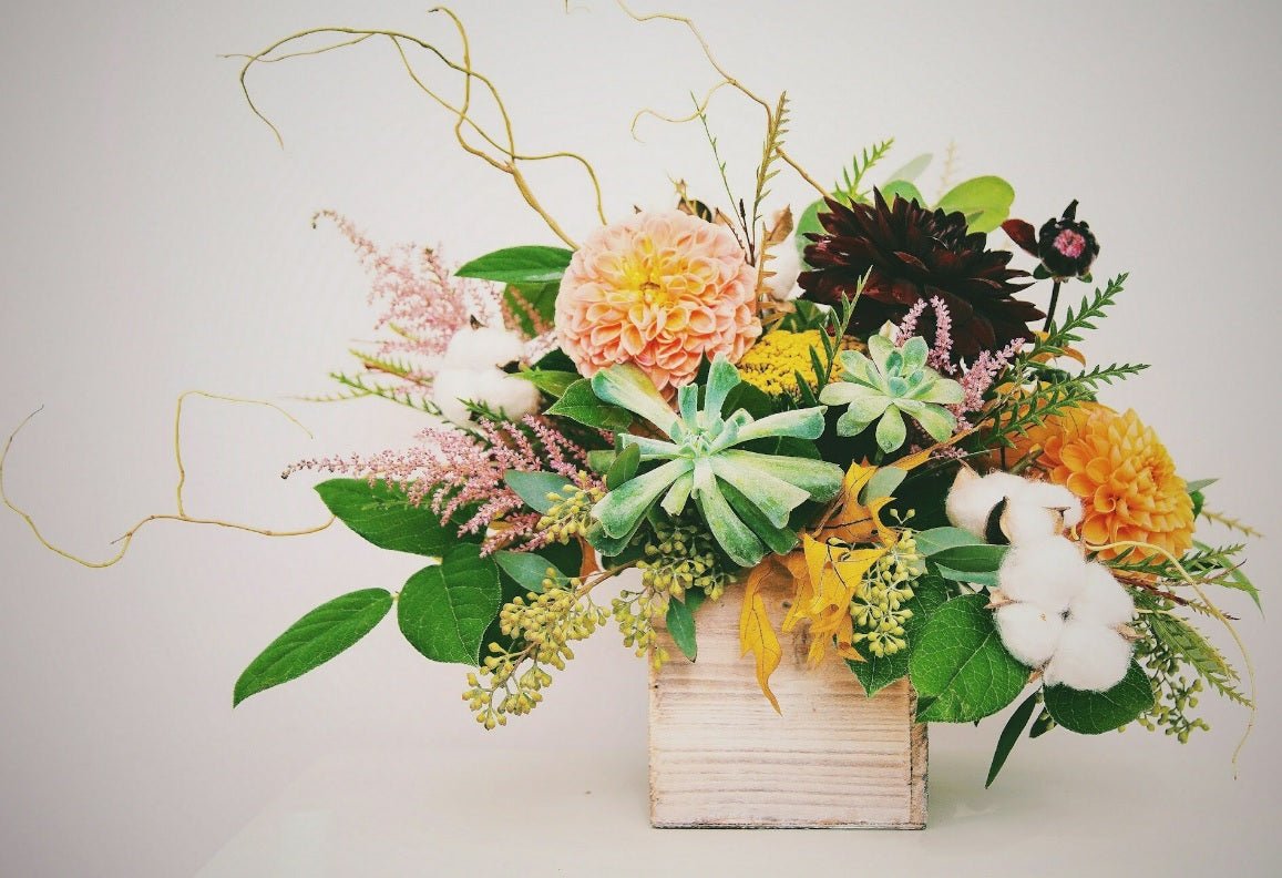 Vibrant summer flower arrangement featuring hydrangeas and sunflowers - Tooka Florist Vancouver
