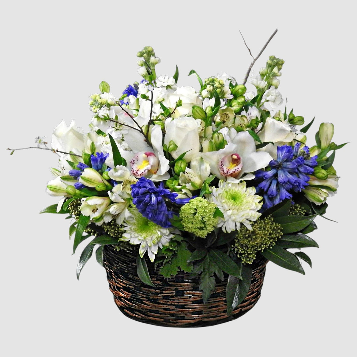 Spring Flower Basket by Tooka Florist – Luxury Flowers Serving North, West & Greater Vancouver
