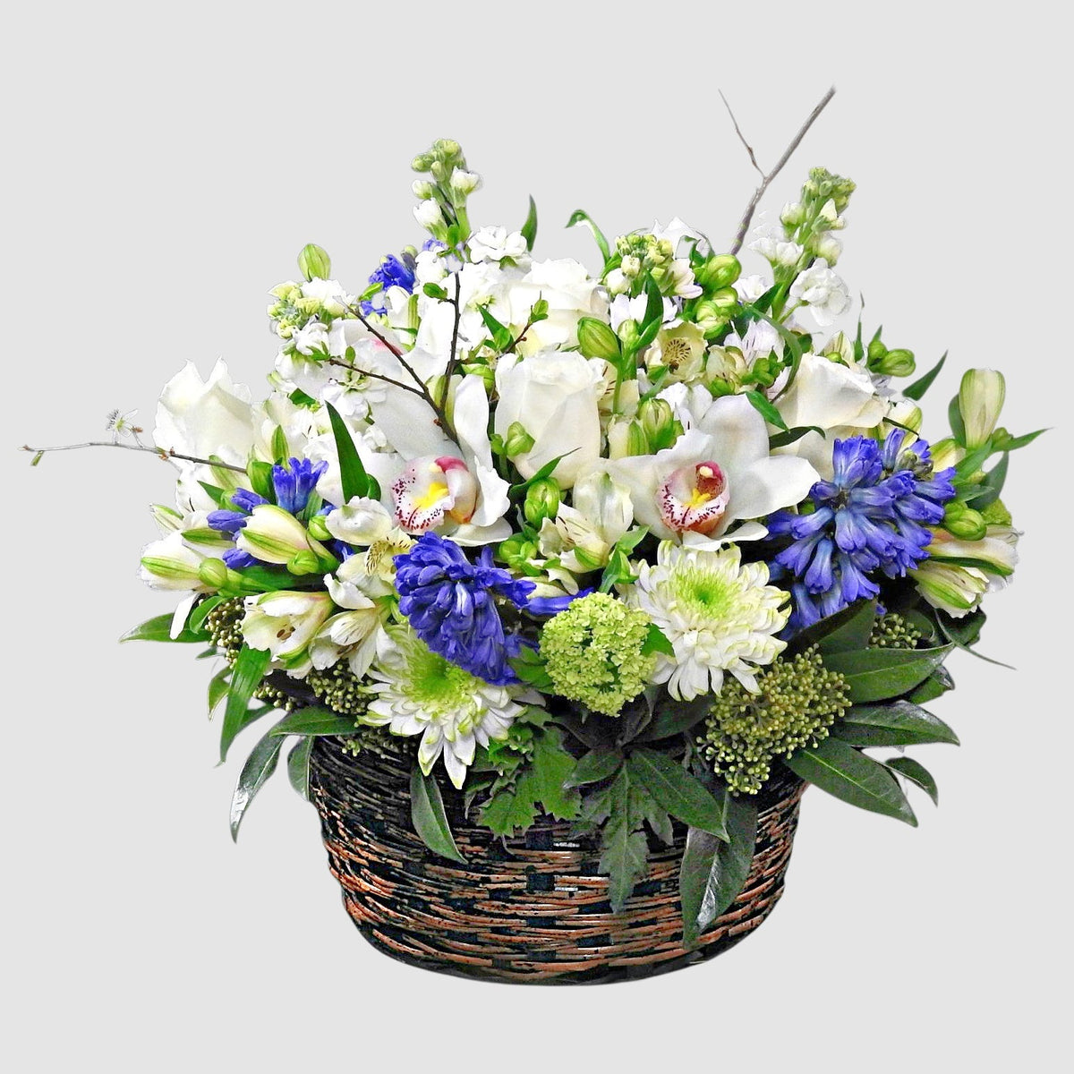Spring Flower Basket by Tooka Florist – Luxury Flowers Serving North, West & Greater Vancouver