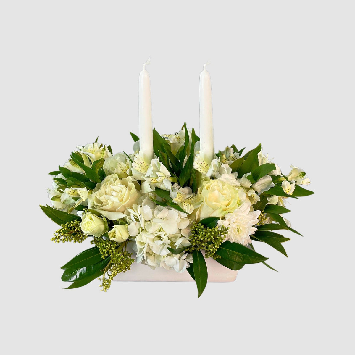 Sympathy candle Arrangement by Tooka Florist – Luxury Flowers Serving North, West & Greater Vancouver