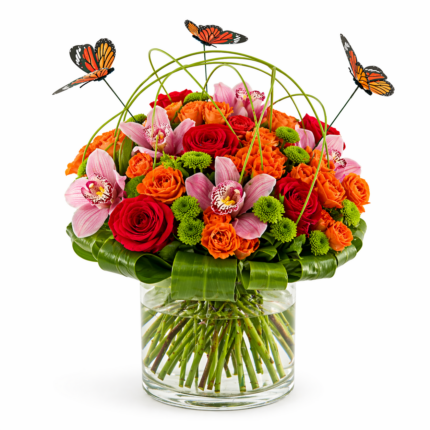 Butterfly Arrangement - Orange roses and pink cymbidium orchids with butterfly accents Vancouver
