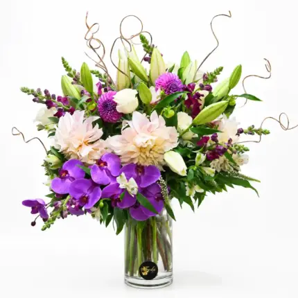 Elegant Garden flower arrangement - Purple orchid peach dahlia and white lily in glass vase Vancouver
