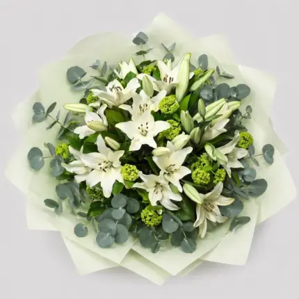 Snow White Bouquet - White lilies and eucalyptus bouquet in light green wrapping Vancouver