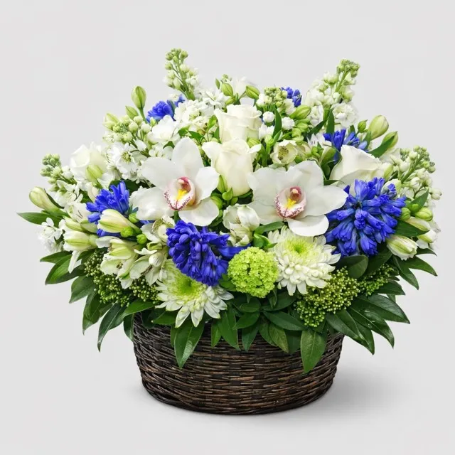 Spring Flower Basket Spring Flower Basket - White orchids, blue hyacinths, and white roses in dark woven basket Vancouver
