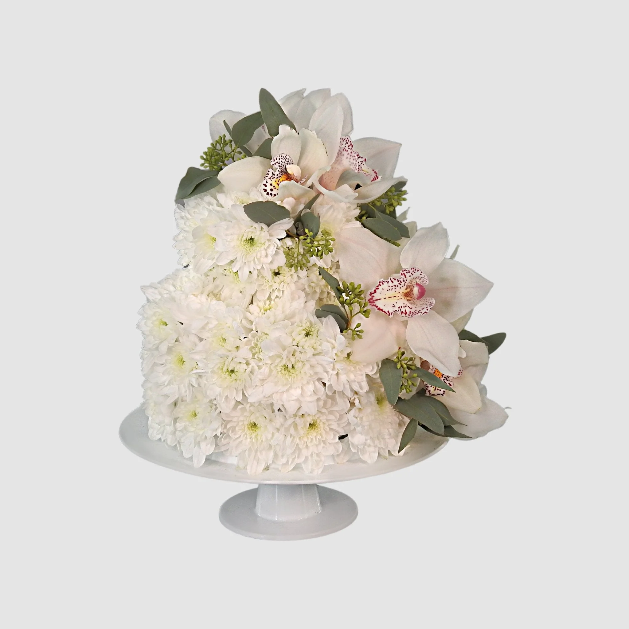 Two Tiered Flower Cake Two Tiered Flower Cake - White orchid and chrysanthemum floral cake arrangement Vancouver