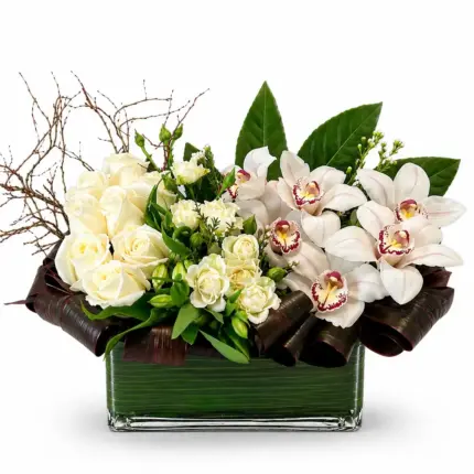 Classic Rose arrangement - White cymbidium orchids and roses in glass vase Vancouver
