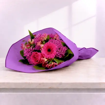 Miss Pinky Bouquet - Vibrant hot pink gerbera and rose bouquet wrapped in purple paper Vancouver