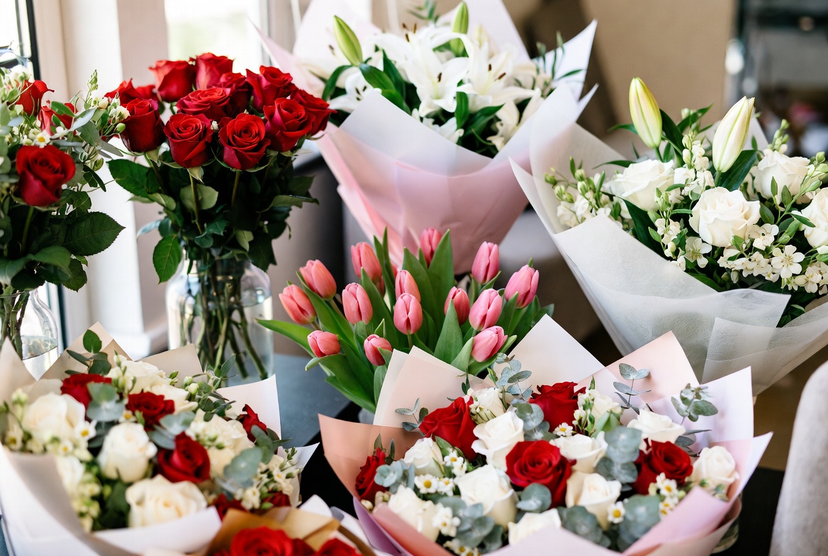 Valentine flower guide infographic with red roses pink peonies sunflowers and potted orchids for romantic gifts