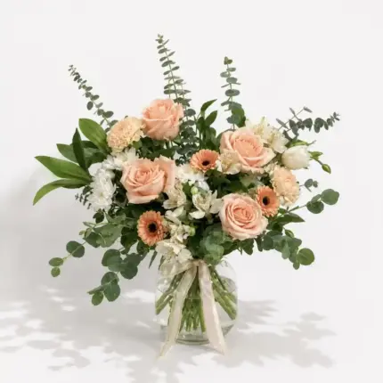 Peach Punch flower arrangement - Elegant peach roses and mini gerberas in glass vase Vancouver